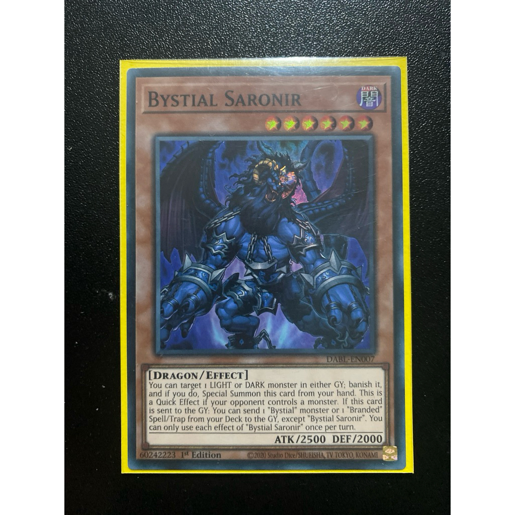 Bystial Saronir (Dmg góc mặt sau) - Super TCG UK - DABL-EN007