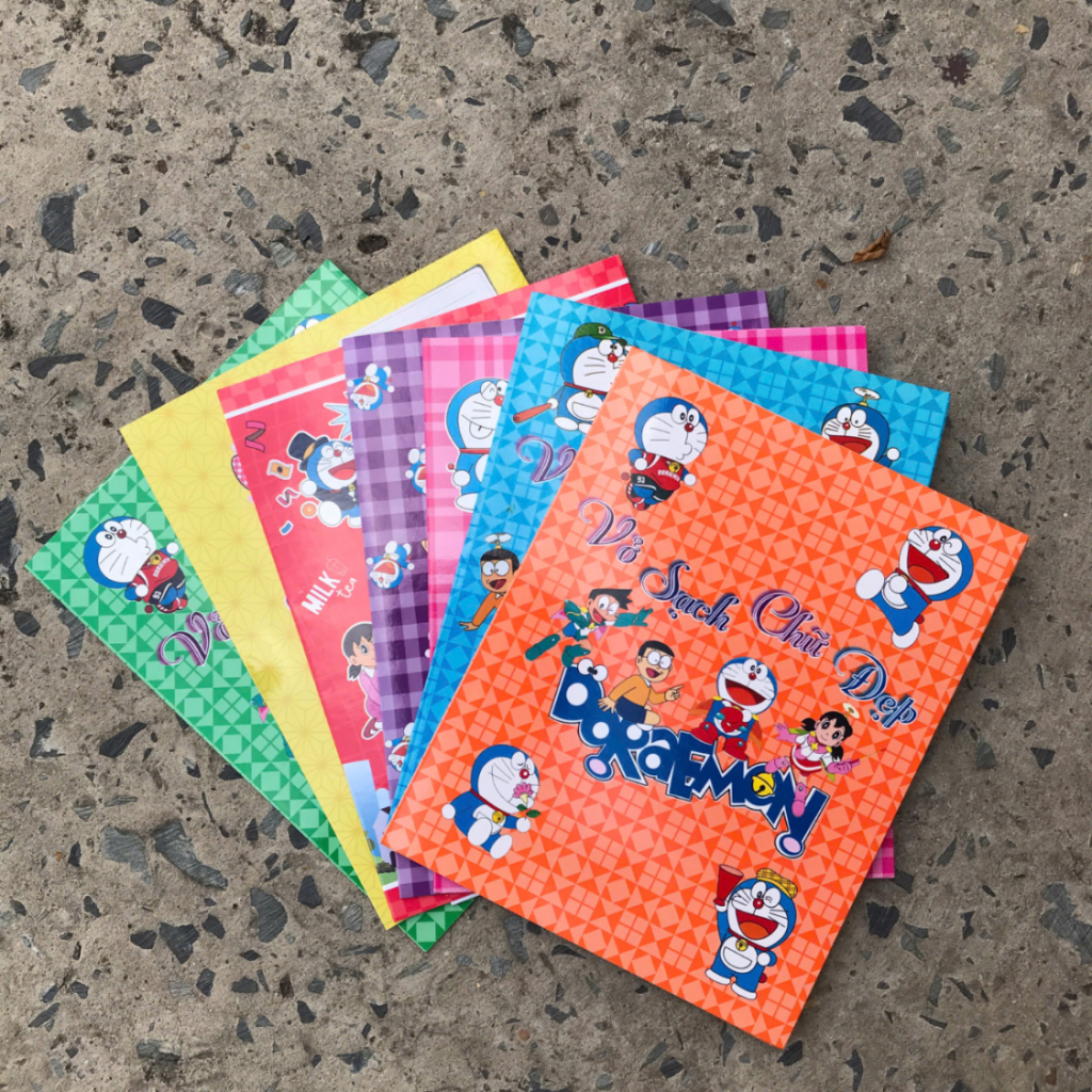 Combo 7 Bìa Bao Vở +7 Bìa Kê Tay Doraemon Dễ Thương (dùng cho vở kích thước 15.5*20.5cm)