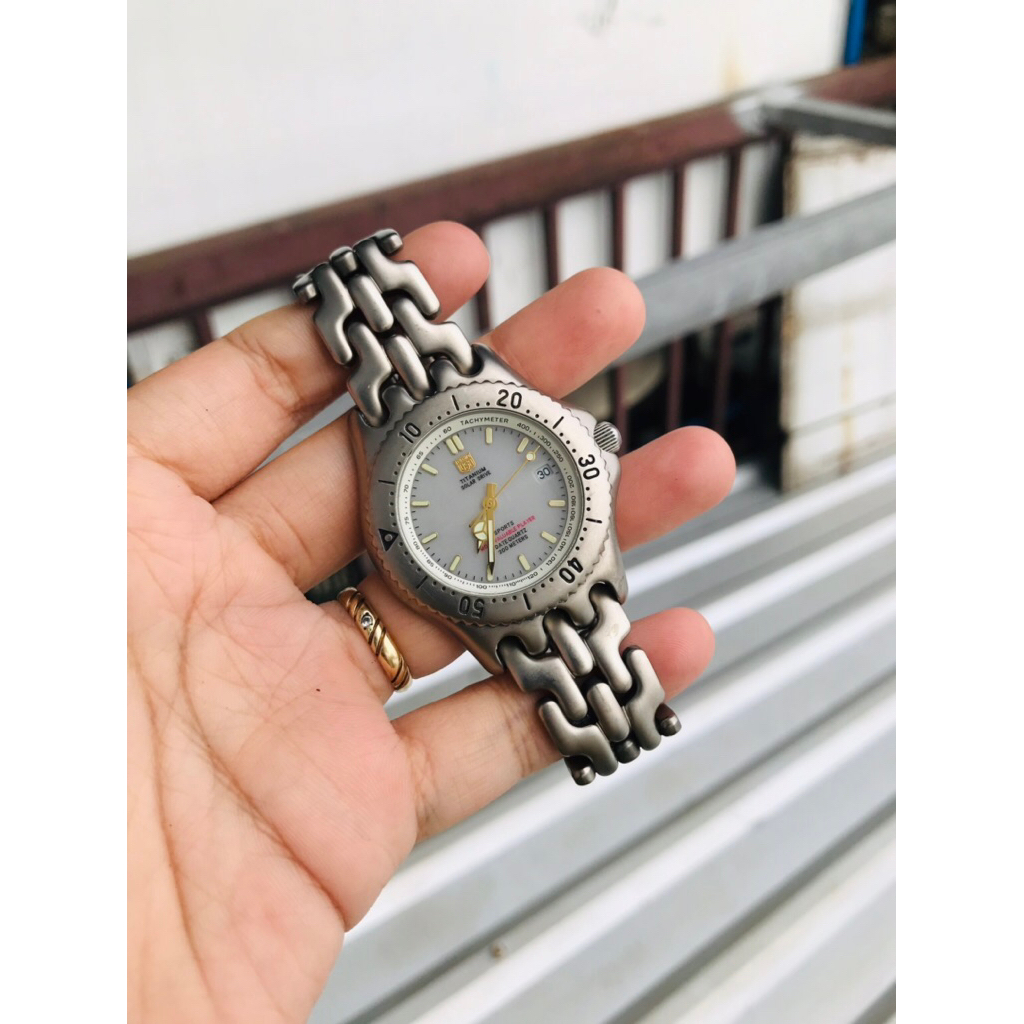 Đồng hồ nam si nhật Elgin USA titanium pin năng lượng dây xương cá size 37mm mặt dạ quang niềng xoay