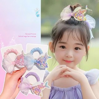 Cột tóc đuôi cá kim tuyến lấp lánh dễ thương cho bé đi biển đi chơi