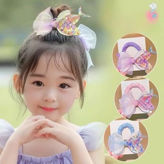 Cột tóc đuôi cá kim tuyến lấp lánh dễ thương cho bé đi biển đi chơi