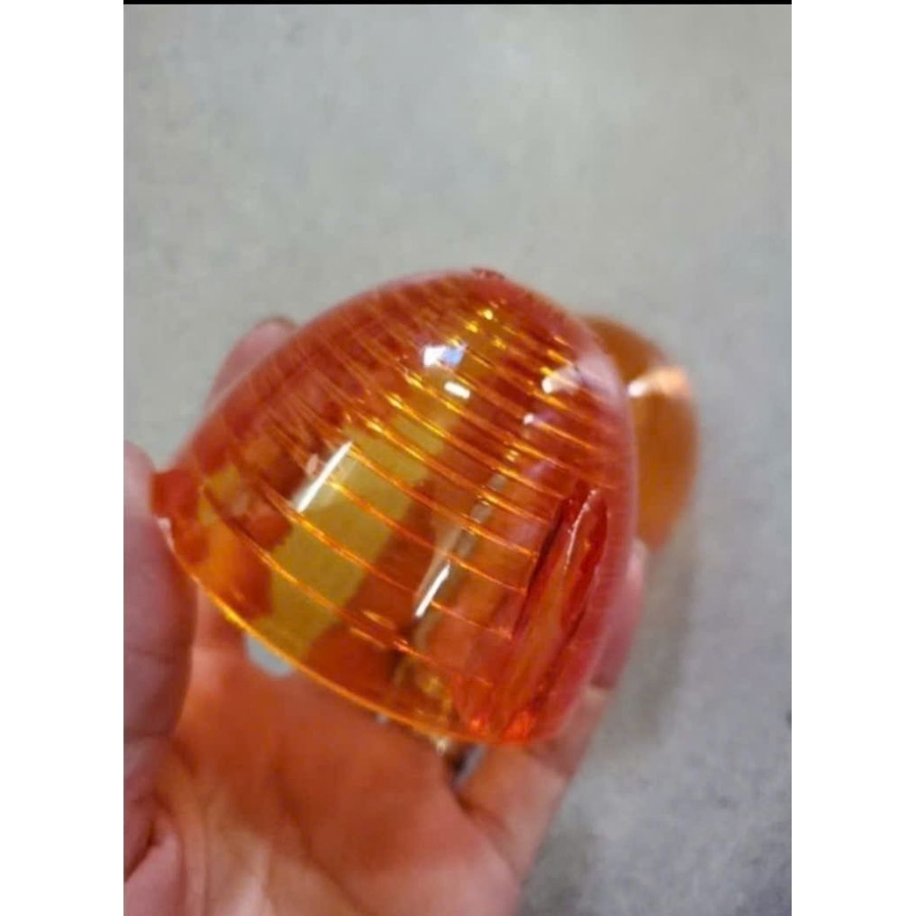 Chụp đèn xi nhan xe 67 màu cam( 1 cái ).