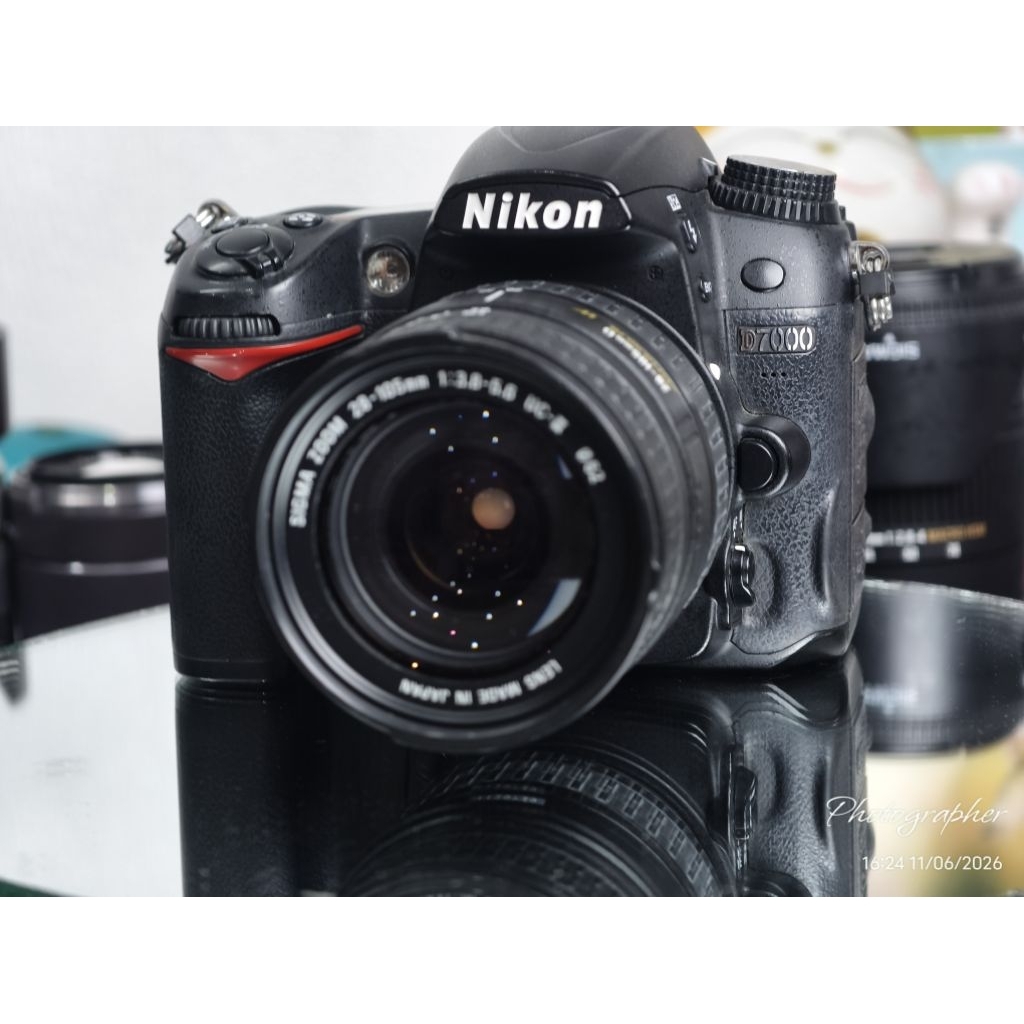 máy ảnh nikon d7000 mới 99% lens pin sạc thẻ