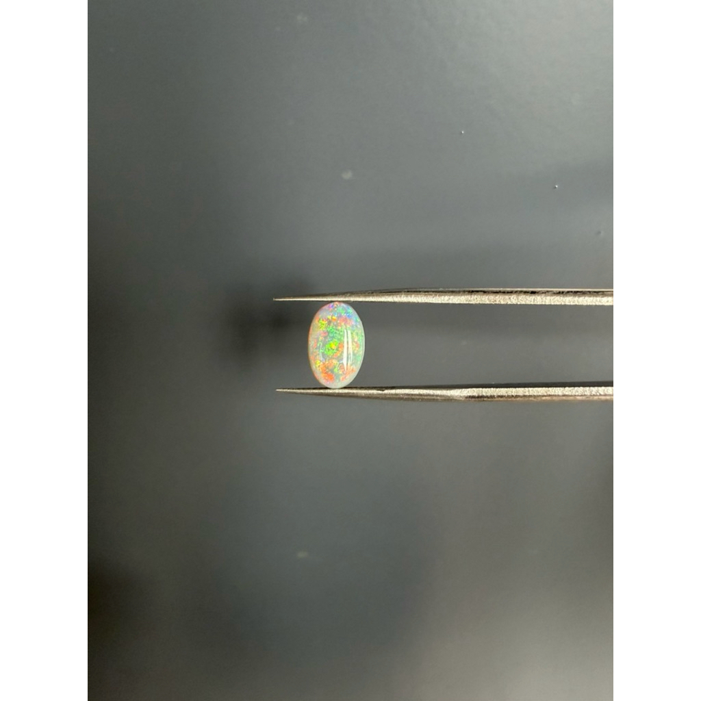 N. Black Opal- Australia- Oval- 11.1x7.2x5.4mm SG2181