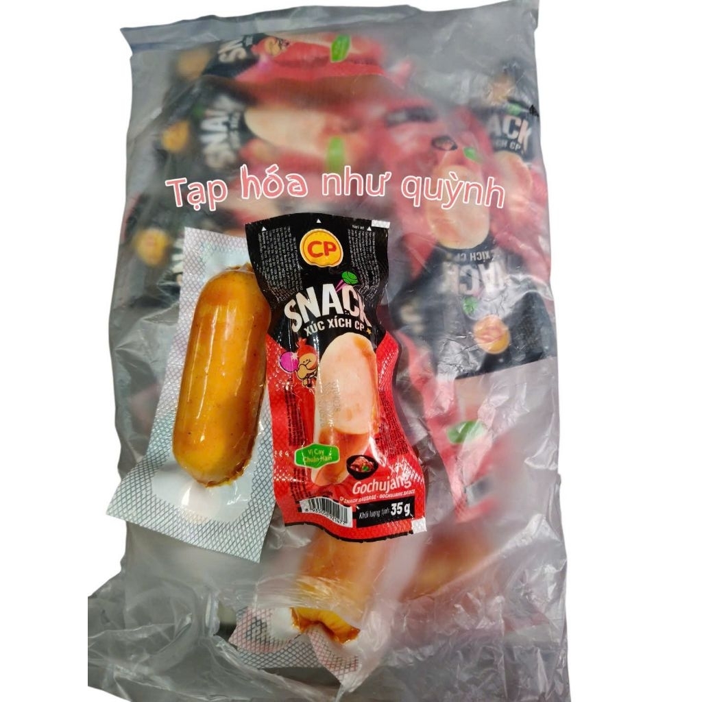 ĐỎ CAY GIÒN NGON) TÚI 20 CÂY *33G  XÚC XÍCH SNACK CP THƠM GIÒN NGON