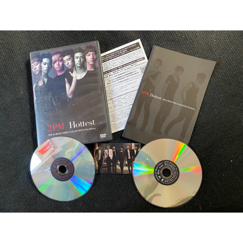 2pm album Hottest đã khui seal, gồm 2 DVD photocard photobook như hình.