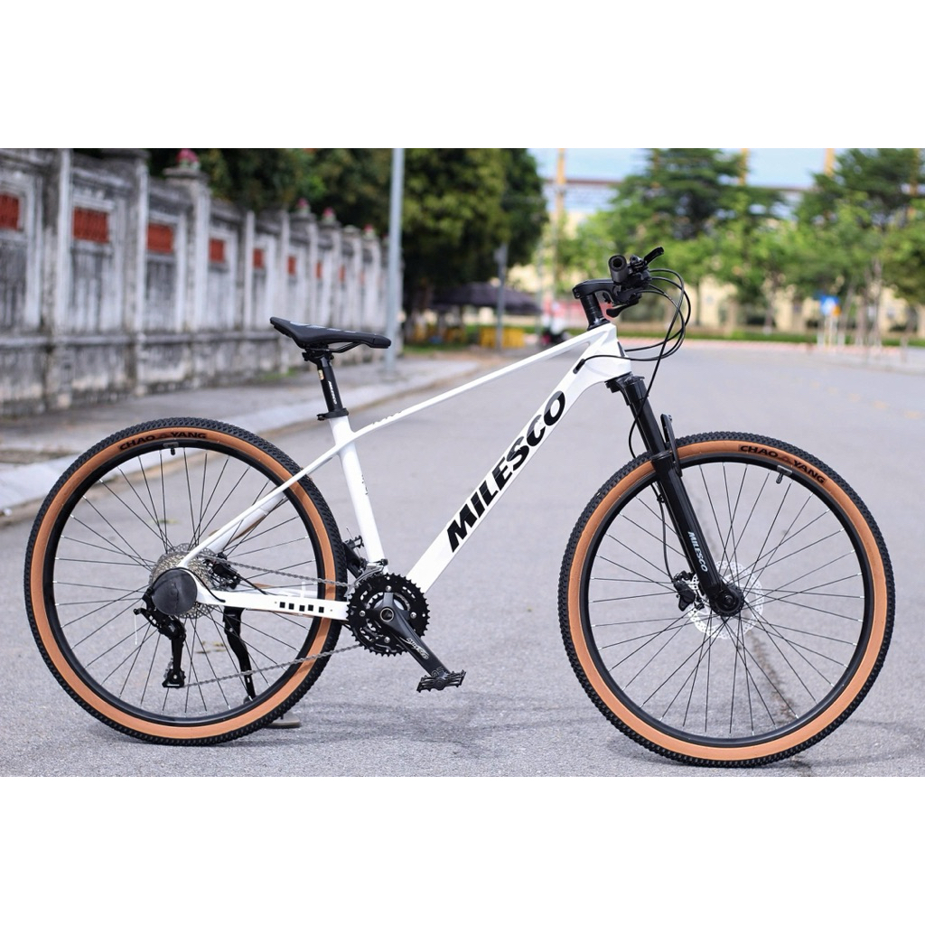 Xe Đạp MILESCO K400 • Khung nhôm liền khối , phanh dầu, trục rỗng, Ltwoo 3*9, moay-ơ 6 bạc đạn cối n