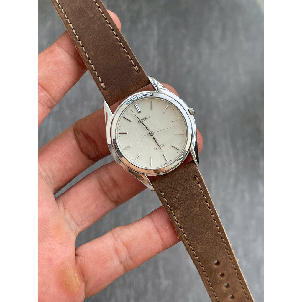 Đồng hồ nam Seiko Dolce kính saphia mặt trắng vân size mặt 34.5mm chạy pin hàng si