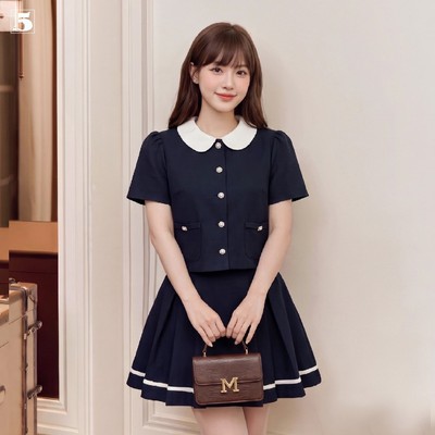 Set bộ nữ Twentyfive gồm áo kiểu ngắn tay cổ phối sen, cúc đá và chân váy ngắn xếp ly ngắn SAVH81