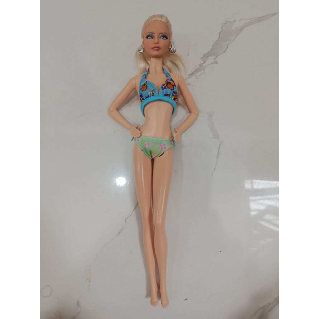 Búp bê Barbie muse nude lỗi face.