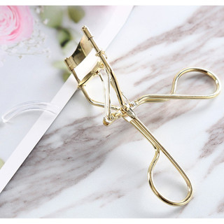 Kẹp uốn mi và làm cong mi