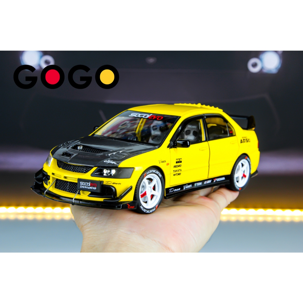 Mô hình xe Mitsubishi Lancer Evo IX JDM 1/24 Vàng