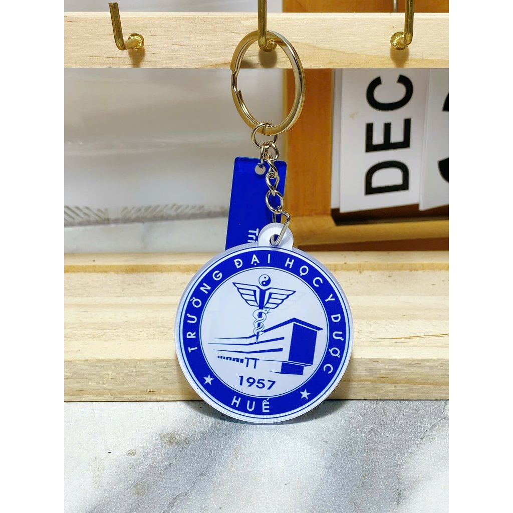 Móc khóa logo các trường đại học - móc khóa đôi kèm tag slogan in theo yêu cầu