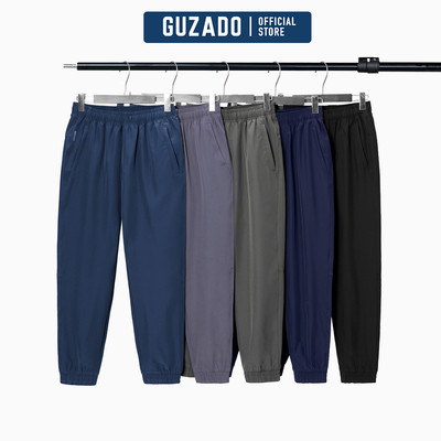 Quần JOGGER Nam GUZADO Vải Gió Thể Thao Mềm Nhẹ, Ống Bo Tôn Dáng Trẻ Trung Khỏe Khoắn GDC2602-GADC25W002