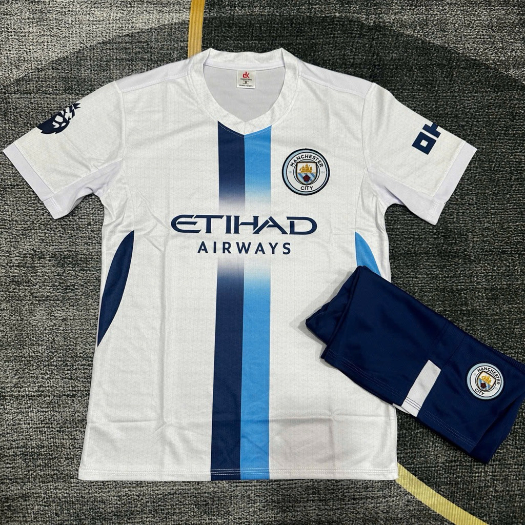 Áo bóng đá Man City đen in theo yêu cầu, vải thun mè.
