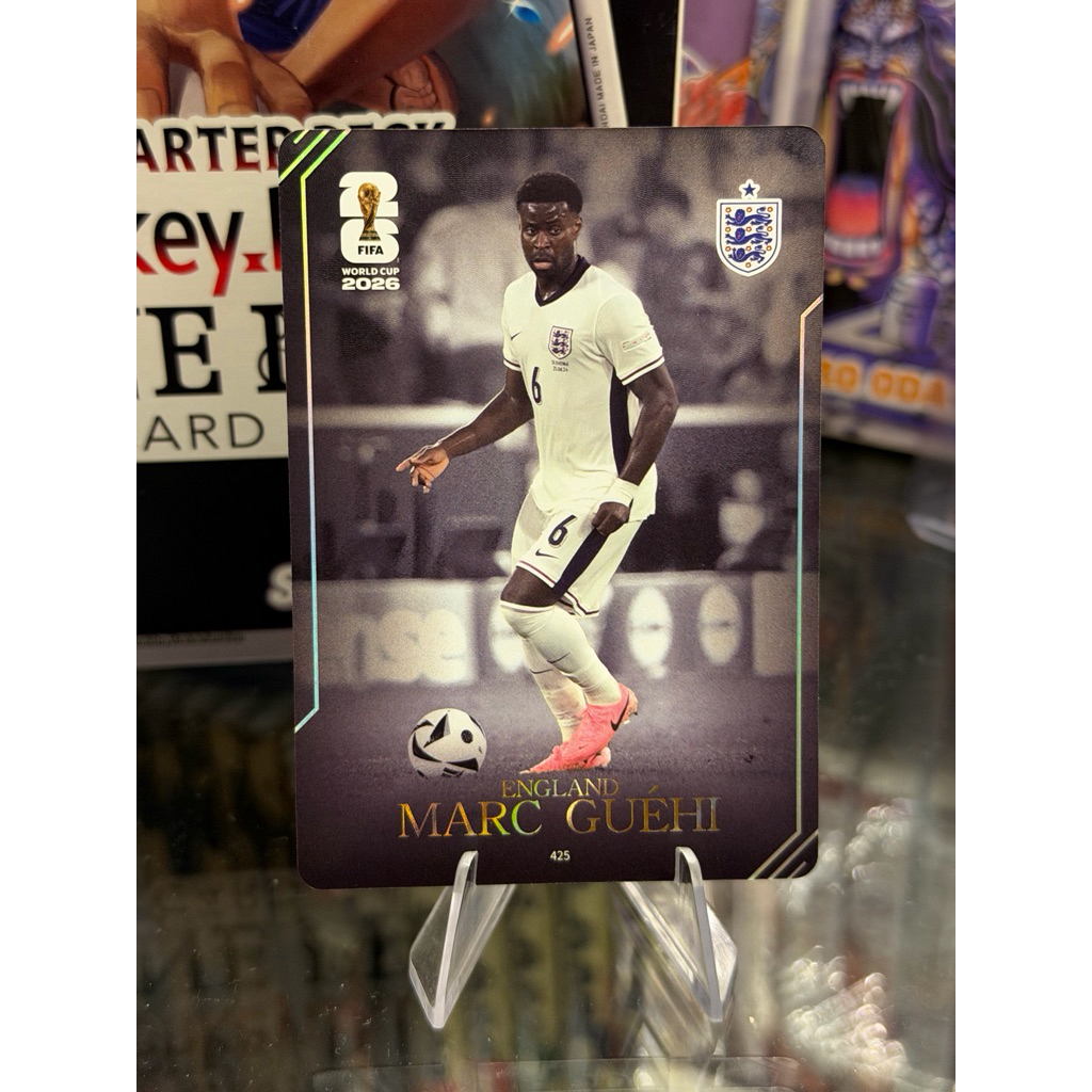 Thẻ Cầu Thủ Marc Guehi Panini Kayou World Cup 2026 Áo Tuyển Anh MOMENT CARD