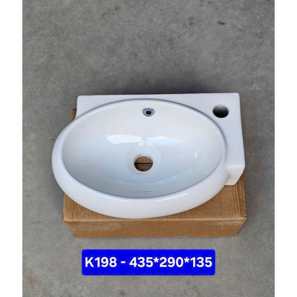 Lavabo treo tường màu trắng. Lavabo góc treo tường