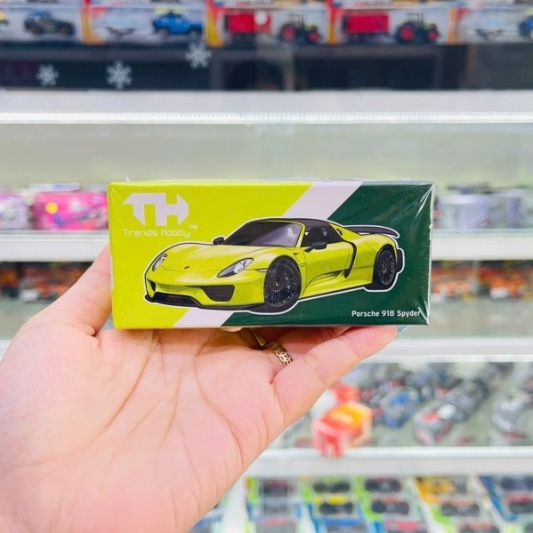 Mô hình xe Porsche 918 Spyder Yellow tỉ lệ 1:64 Trends Hobby 241086A