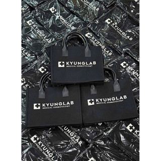 thanh ly  tl Túi du lịch có quai xách tay cầm  màu đen xịn xò Kyung Lab có khoá kéo 29x36 )