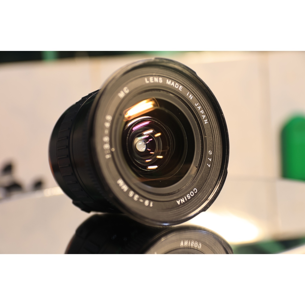 ống kính gốc rộng Canon ef Cosina 19-35mm chụp chống cháy (góc rộng hình ảnh tương đối nét- bi xứt bên trong)