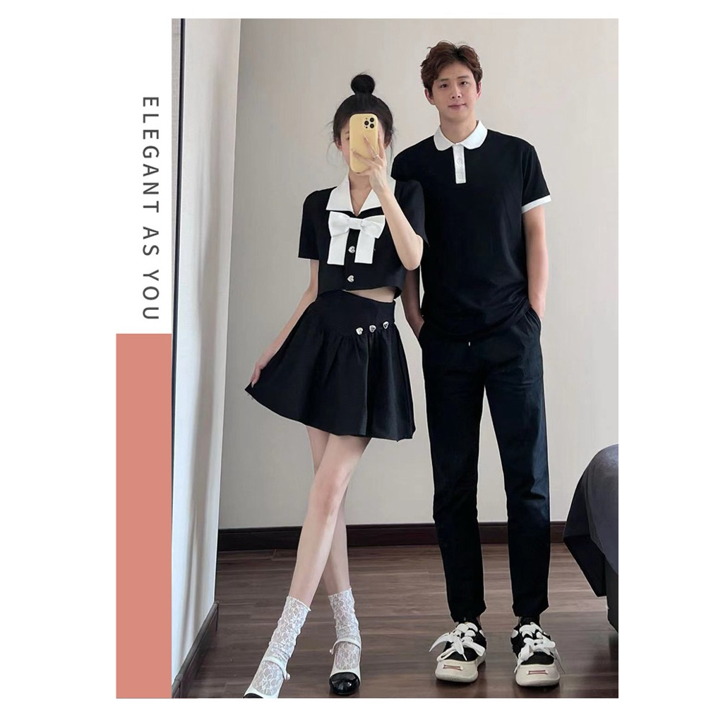 (Tặng bộ nhẫn nữ xinh) Sét bộ đôi nam polo nữ áo thắt nơ và chân váy đính cúc tim siêu cute