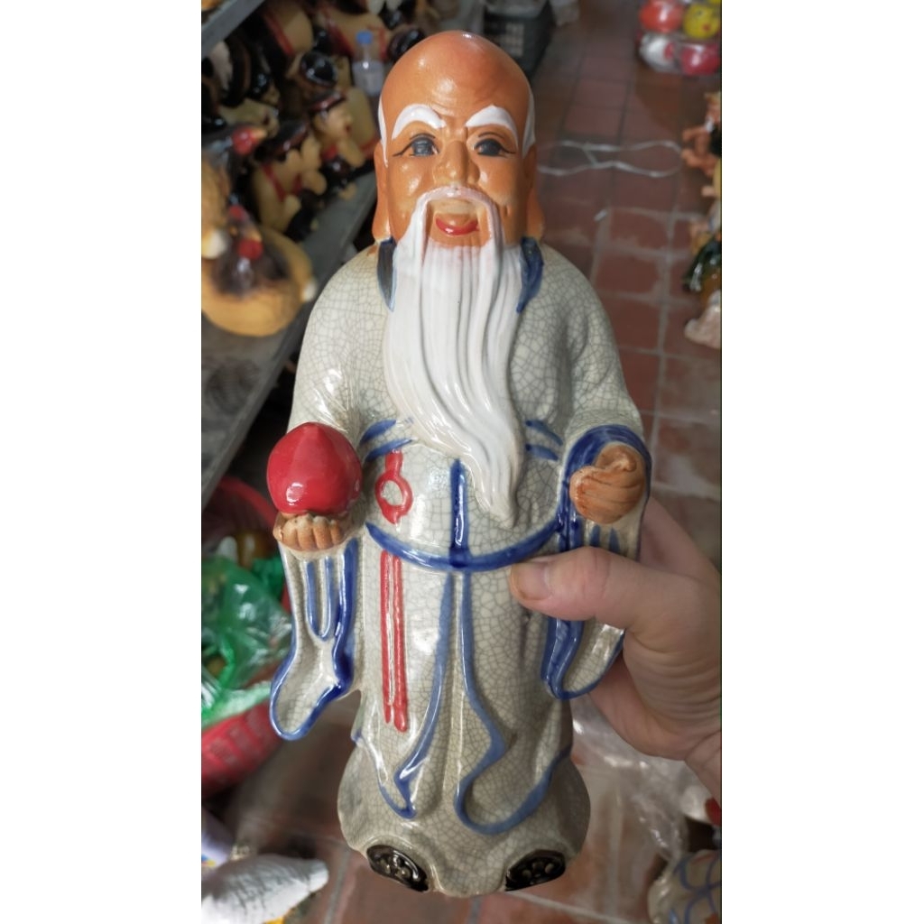 Tượng gốm Ông Thọ ghép cây
