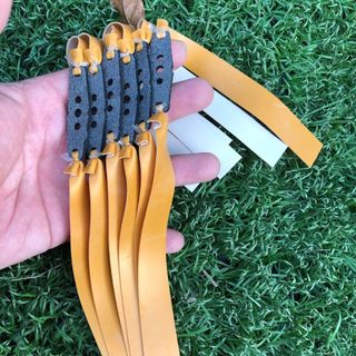 10 dây thun Adam - Pro màu vàng ánh kim 0,65mm, kéo tới má