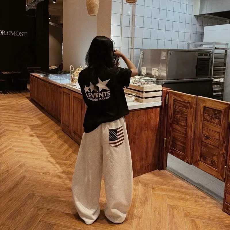 Quần suông nữ ống rộng Unisex,quần nỉ cạp chun dây rút phối túi sau in cờ chất nỉ mềm basic dễ mặc phong cách Hàn | BigBuy360 - bigbuy360.vn