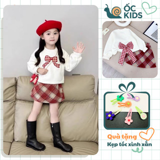 Bộ váy áo thu đông chất liệu nỉ da cá thắt nơ lưng kết hợp chân váy dạ kẻ caro cạp chun cho bé gái 8-30kg. ( A08 )