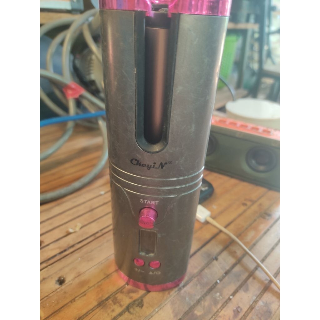 Máy uốn tóc mini xài pin thanh lý