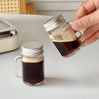  Ly thủy tinh mini có quai kèm nắp – hũ đựng gia vị mật ong thạch cà phê nhỏ gọn 
