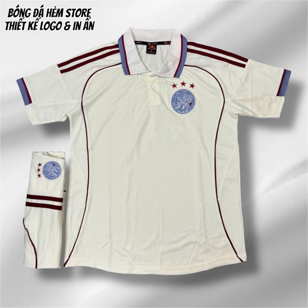 Bộ quần áo bóng đá Ajax kem và xanh đen mới vải mè cao cấp