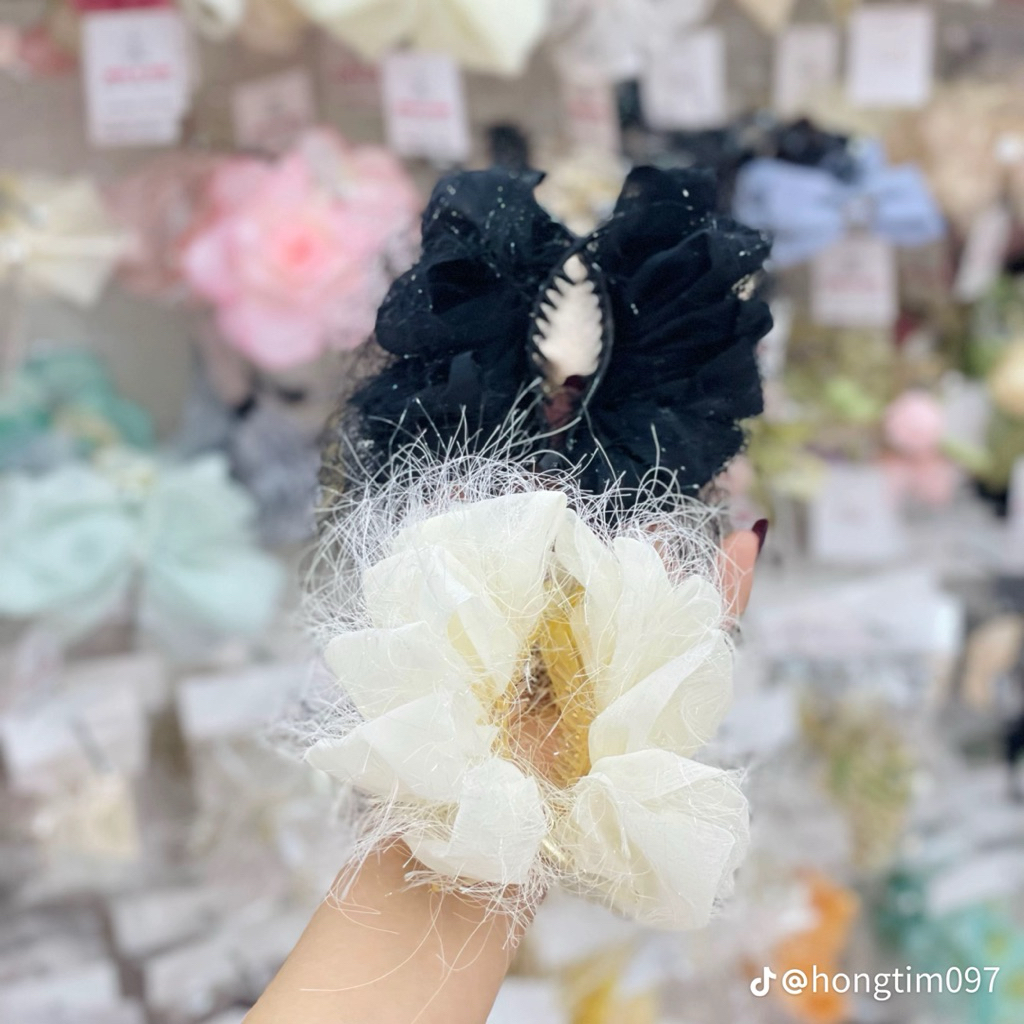 Kẹp càng cua lông vũ