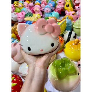 heo tiết kiêm(heo sứ kitty)lỗ tròn và ngang size ngang 15cm cao 13