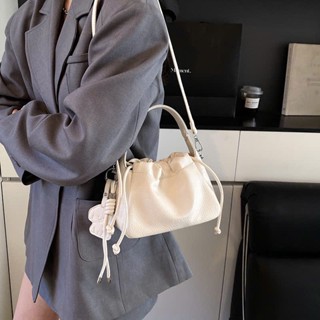  Túi xách nữ da PU dáng rút dây mini thời trang hàn quốc kèm charm dễ thương đeo chéo đeo vai Báo Store - TXN224 