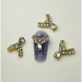 2 charm nail Y vàng đá mã 18