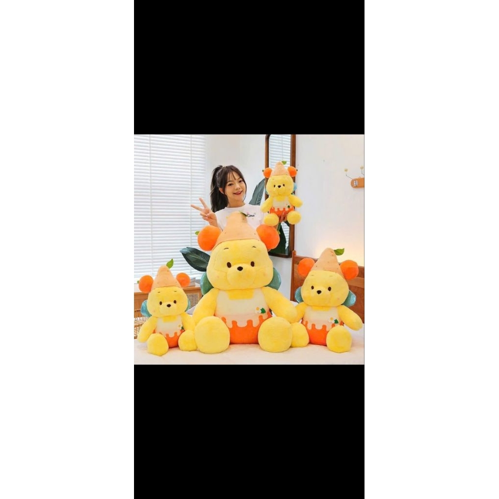 gấu bông, thú nhồi bông mẫu gấu pooh cam ngồi size 70cm