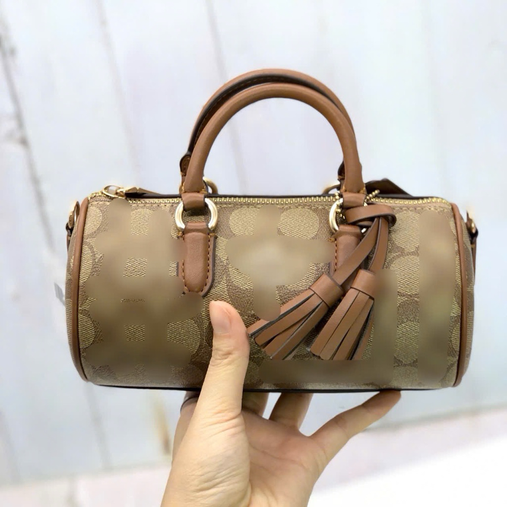 Túi trống mini LACEY CROSSBODY IN SIGNATURE CANVAS