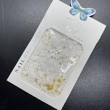 Charm hoa sứ đính móng kèm bi sắt vàng bạc