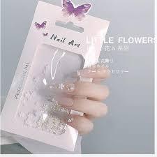 Charm hoa sứ đính móng kèm bi sắt vàng bạc