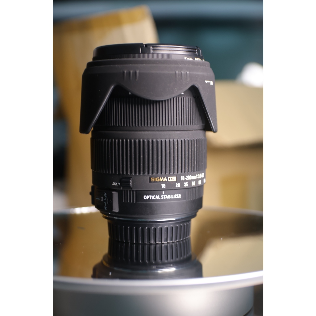 lens canon Sigma 18-200mm f/3.5-6.3 DC OS for Canon ef-s (Tình trạng kính 97% có 1 điểm mốc thấu kính lớn) - Ống kính Canon EF