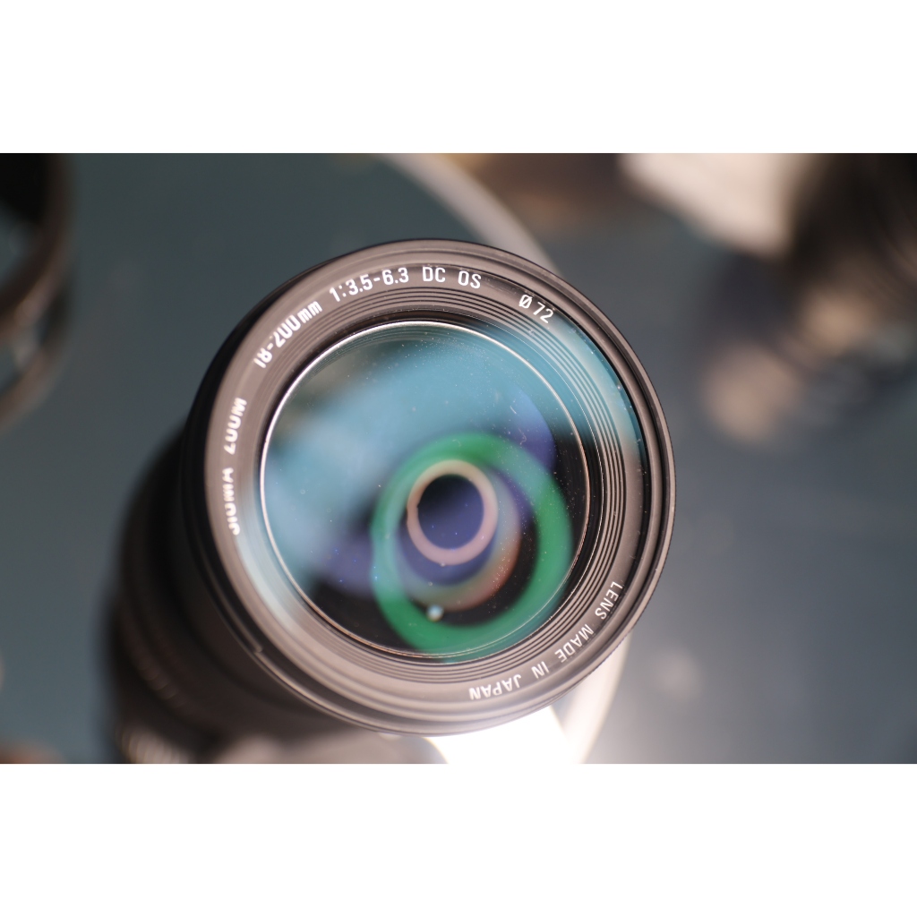 lens canon Sigma 18-200mm f/3.5-6.3 DC OS for Canon ef-s (Tình trạng kính 97% có 1 điểm mốc thấu kính lớn) - Ống kính Canon EF