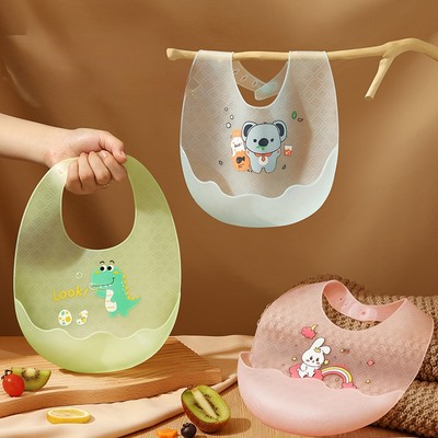 Yếm ăn dặm silicon cho bé hình trứng KidsWorld có nấc điều chỉnh siêu mỏng và mềm mại