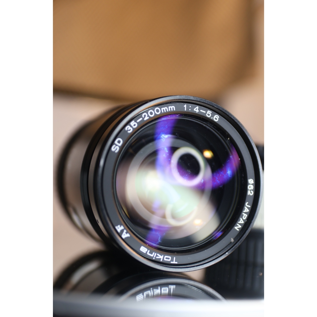 ống kínhTokina AF 35-200mm f/4.5-5.6 (Sony A) - kính 95% (kính sau có nhiều bụi bé) - Ống kính Sony A mount