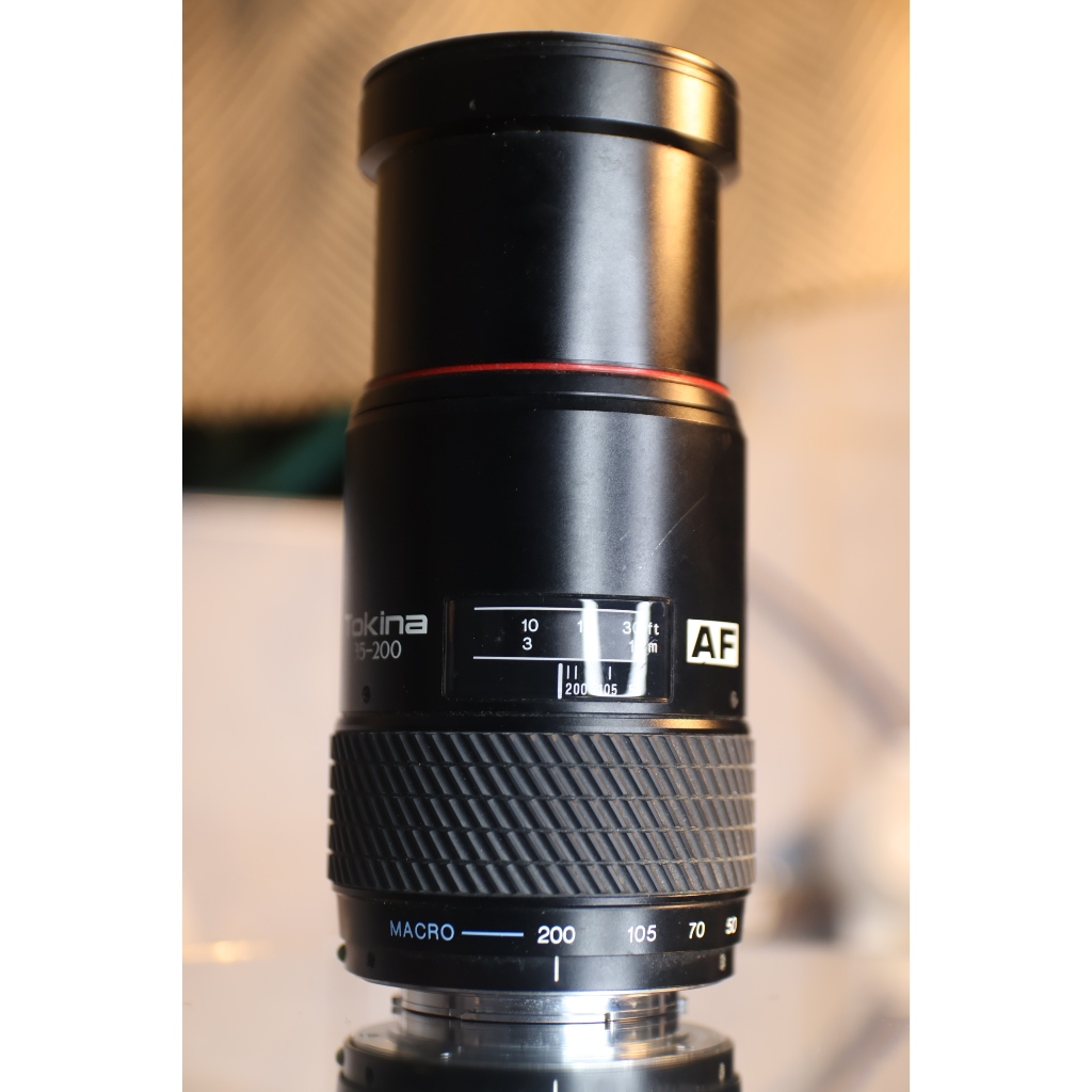 ống kínhTokina AF 35-200mm f/4.5-5.6 (Sony A) - kính 95% (kính sau có nhiều bụi bé) - Ống kính Sony A mount