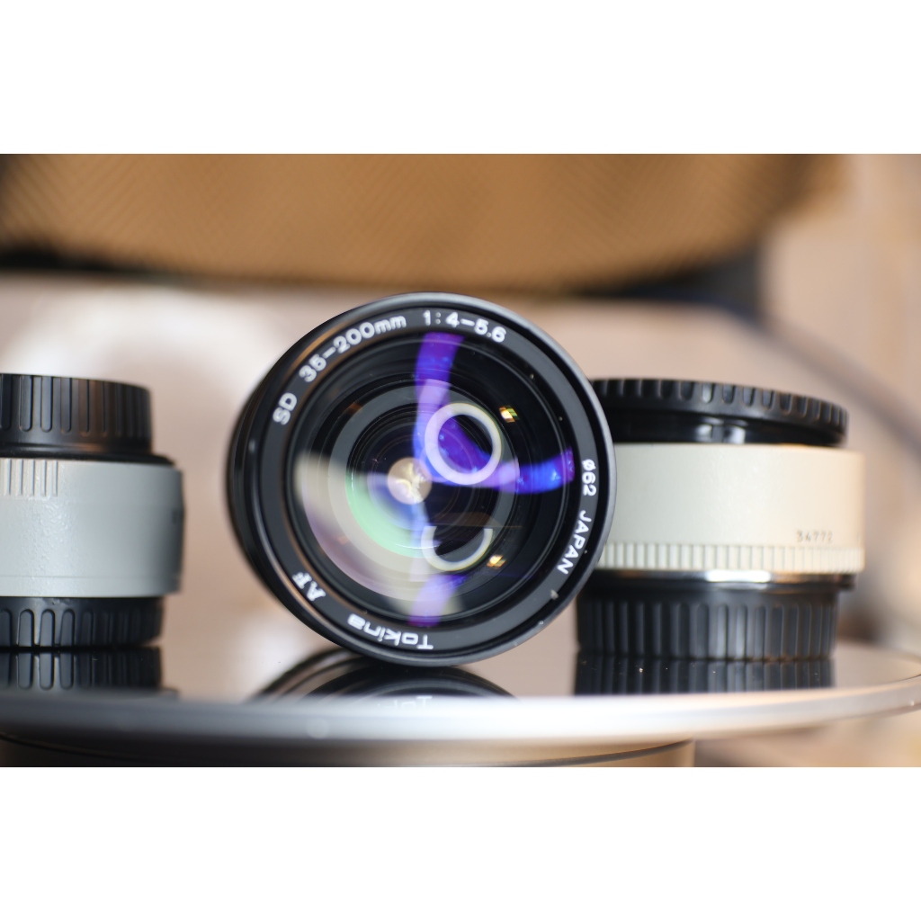 ống kínhTokina AF 35-200mm f/4.5-5.6 (Sony A) - kính 95% (kính sau có nhiều bụi bé) - Ống kính Sony A mount