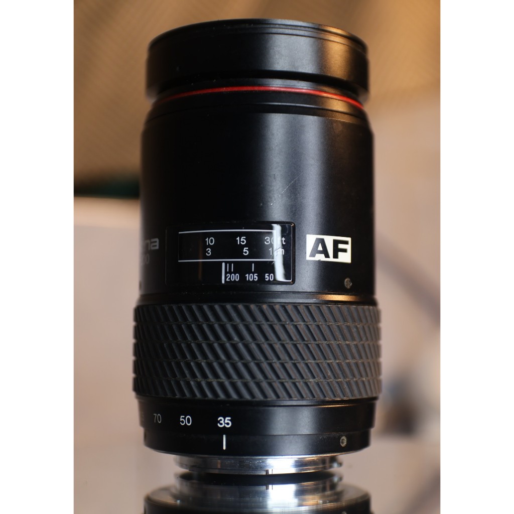 ống kínhTokina AF 35-200mm f/4.5-5.6 (Sony A) - kính 95% (kính sau có nhiều bụi bé) - Ống kính Sony A mount