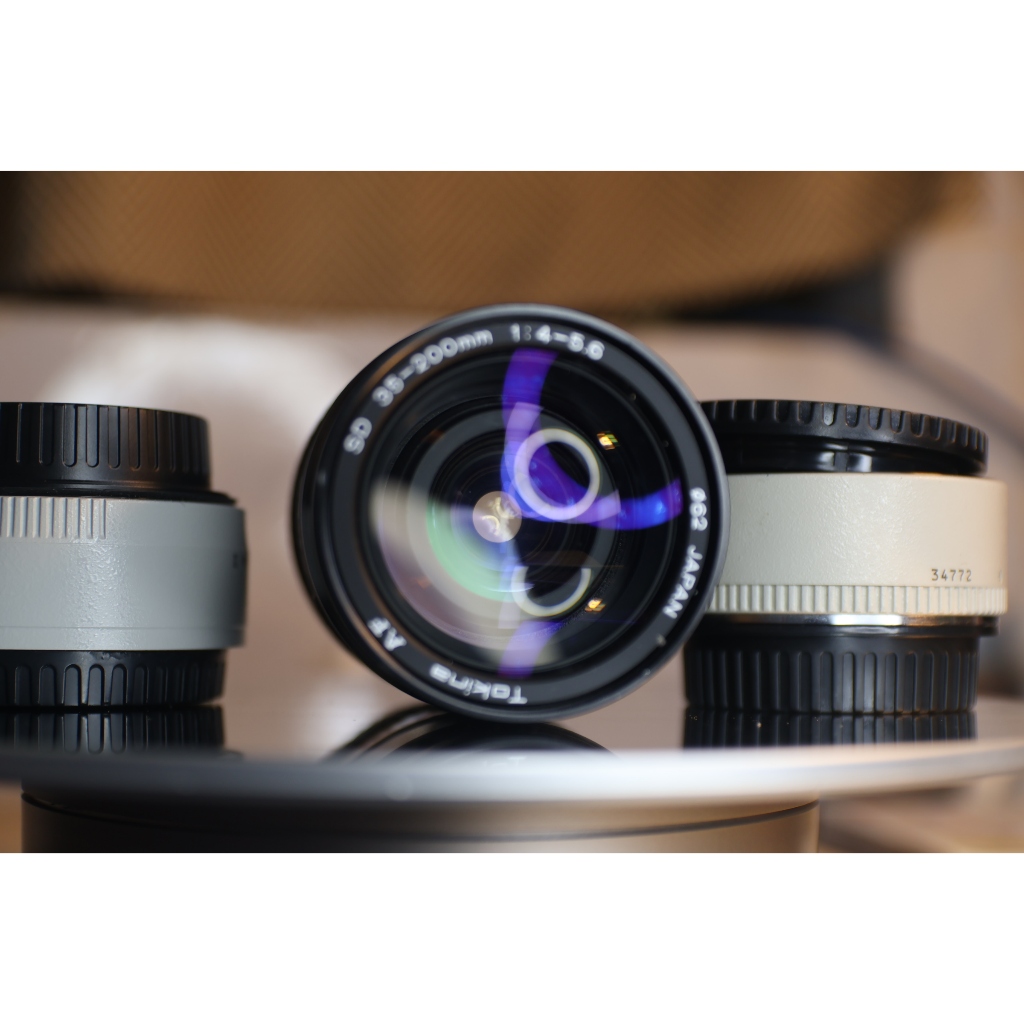 ống kínhTokina AF 35-200mm f/4.5-5.6 (Sony A) - kính 95% (kính sau có nhiều bụi bé) - Ống kính Sony A mount