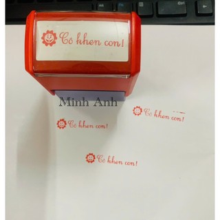 Con dấu "Cô khen con" mặt cười