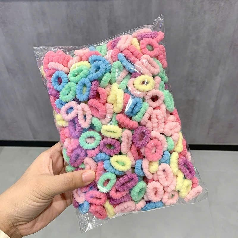 Gói 500 chun buộc tóc thun cột tóc len xù màu sắc tươi sáng đáng yêu cho bé